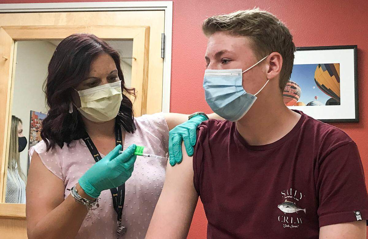 A teenager receives his COVID-19 vaccine in 2021. On Thursday, Rep. Rob Beiswenger called mandated COVID vaccines a “debacle.”