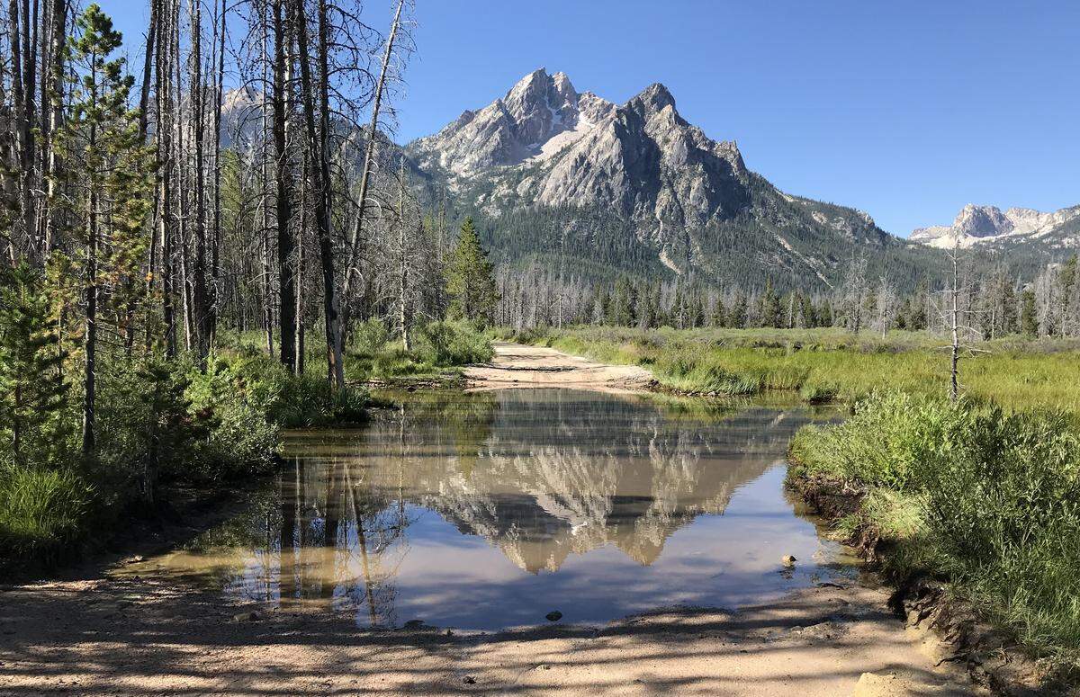 The road to the boat ramp at Stanley Lake in the Sawtooths often is flooded, as it was last week. The ramp will be moved to a more accessible location this year.