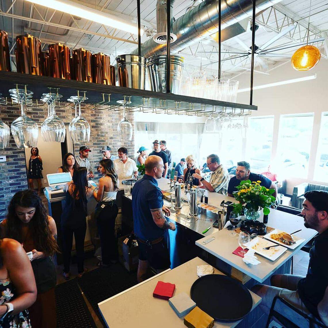 The wine bar has seating for 27. Some customers bring selections from the food truck into the space.