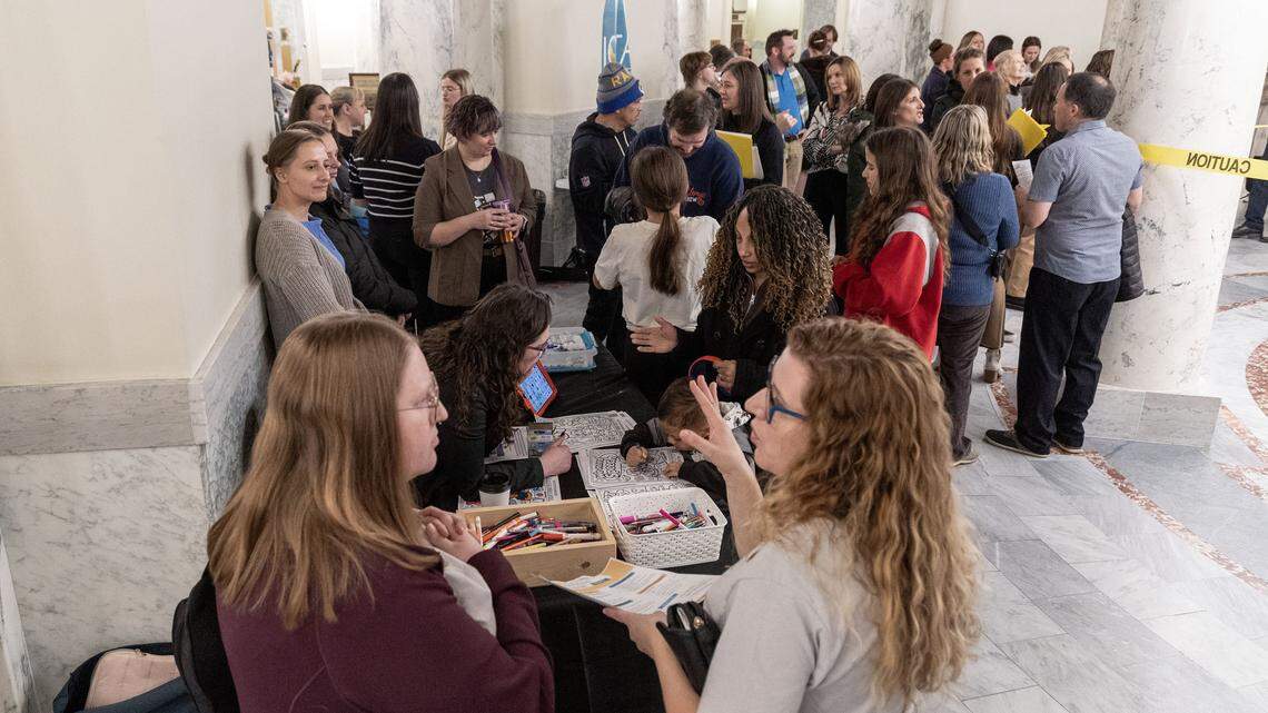 Idahoans who depend on needed services like speech and physical therapy gather on the first floor of the Idaho Capitol with providers of those services. Rehab at the Rotunda drew hundreds of people to help lawmakers recognize the importance of therapy after the Idaho Department of Health and Welfare announced reductions in the number of funded therapy sessions.