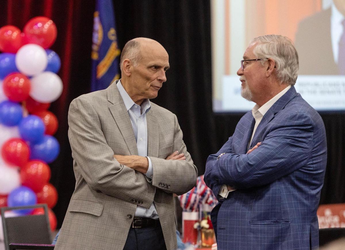 Rep. Bruce Skaug, R-Nampa, right, speaks with Sen. C. Scott Grow, R-Eagle, at a watch party in Boise for Idaho Republican candidates on election night, Nov. 8, 2022.