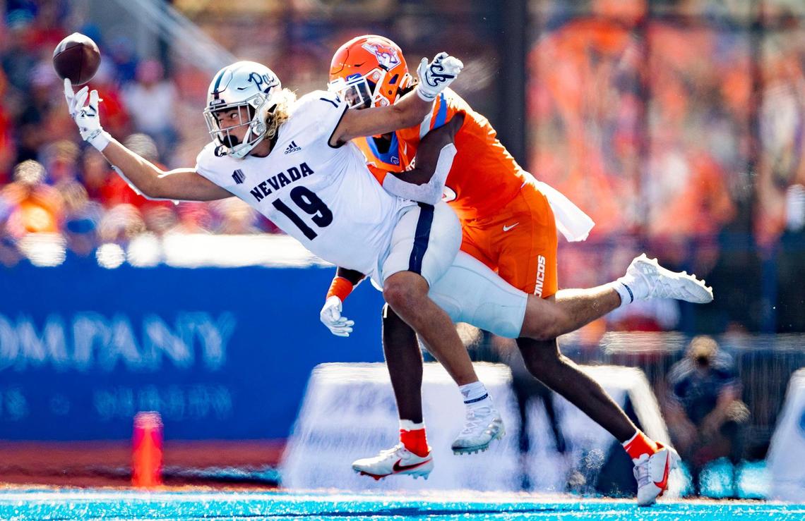 Nevada tight end Cole Turner can’t come up with a catch defended by Boise State safety JL Skinner Saturday, Oct. 2, 2021 at Albertsons Stadium.