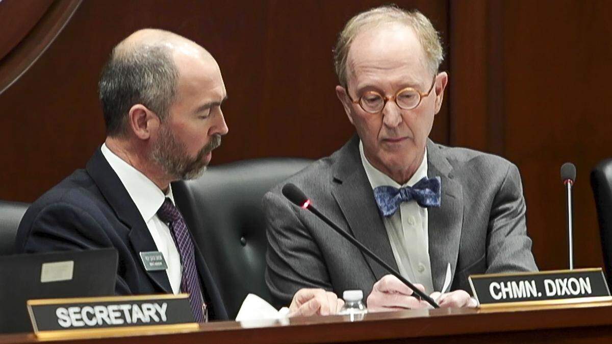 Special counsel Bill Myers, right, confers with Rep. Sage Dixon, a Ponderay Republican and chairman of the Ethics and House Policy Committee, during a hearing over former Rep. Aaron von Ehlinger’s conduct on April 28 at the Capitol.