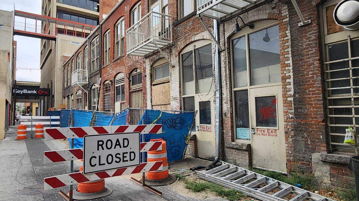 Road closed signs block off part of the alleyway behind the Union Block Building on Aug. 24, 2024.