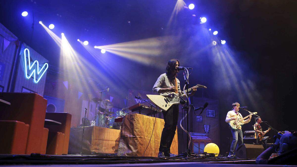 From left, Brian Bell, Rivers Cuomo and Patrick Wilson of Weezer perform in Atlanta this summer. (Georgia, not Idaho!)