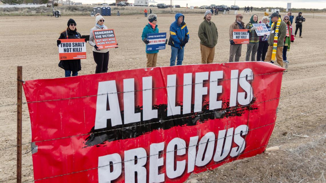 Protesters gather Wednesday outside of the Idaho Maximum Security Institution in Kuna to protest the death penalty.
