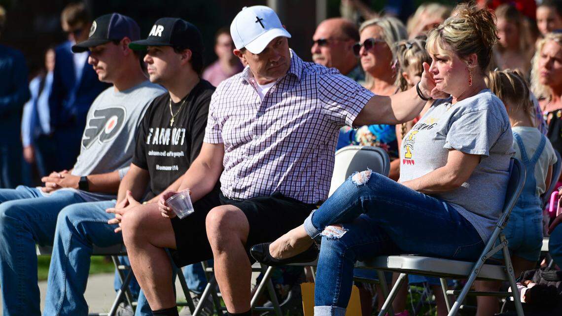 Steve Goncalves, left, wipes tears from the cheek of his wife, Kristi Goncalves, as the two parents of victim Kaylee Goncalves attended the dedication ceremony for the Vandal Healing Garden and Memorial at the University of Idaho in August 2024 in Moscow, Idaho.