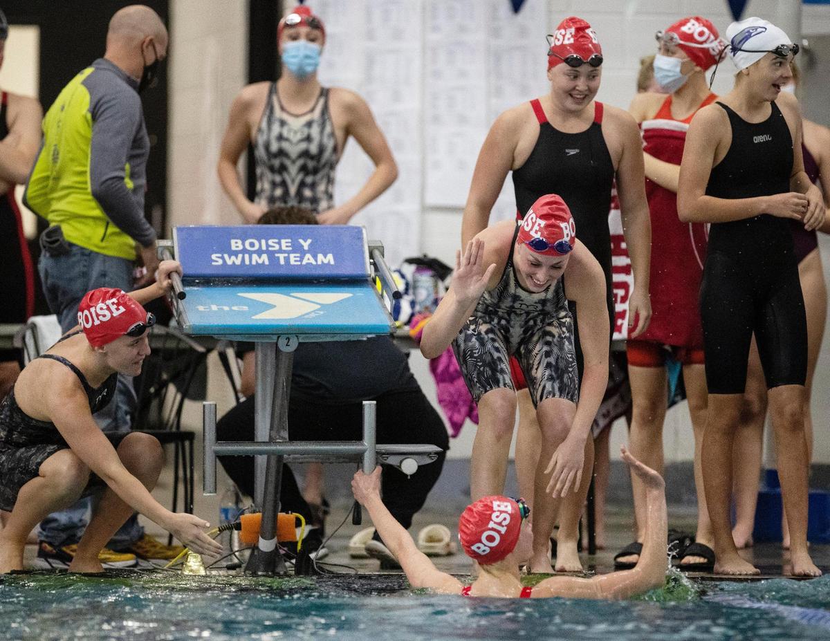 The Boise 200-yard medley team celebrates after taking second at the 5A state meet Saturday at the West Boise YMCA.