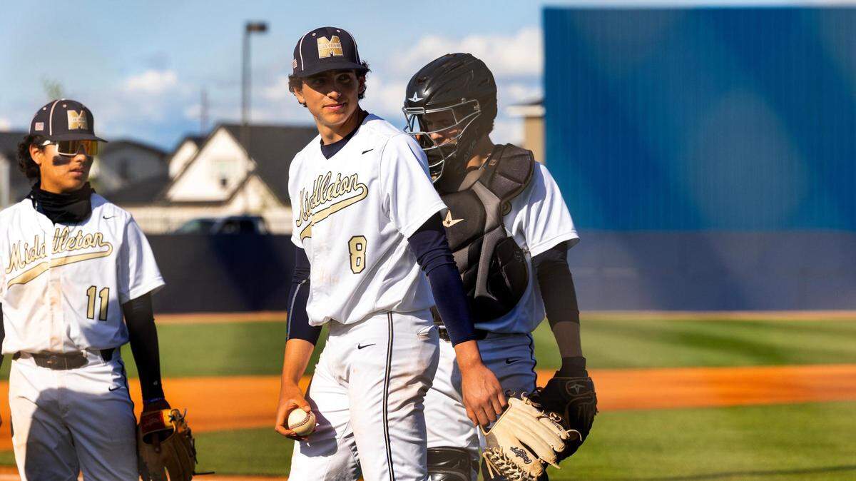Middleton senior Robert Orloski, center, led the Vikings to a 5-3 win over Owyhee in Game 1 of the 5A District Three baseball championship series Tuesday at Middleton High.