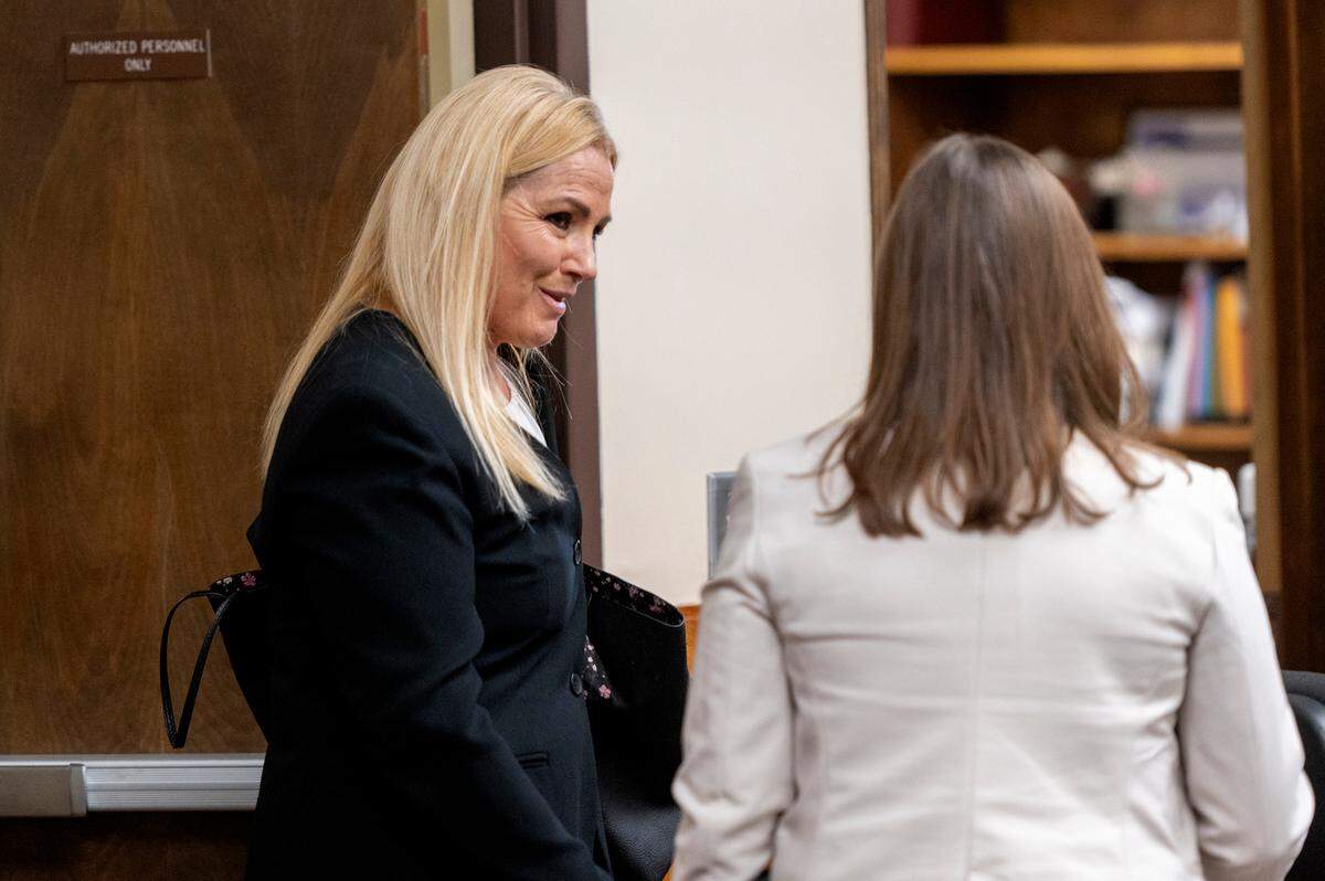 Anne Taylor, left, Bryan Kohberger’s lead public defender, speaks with state prosecutors during his arraignment hearing in May. Kohberger is charged with the murder of four University of Idaho students in November 2022.
