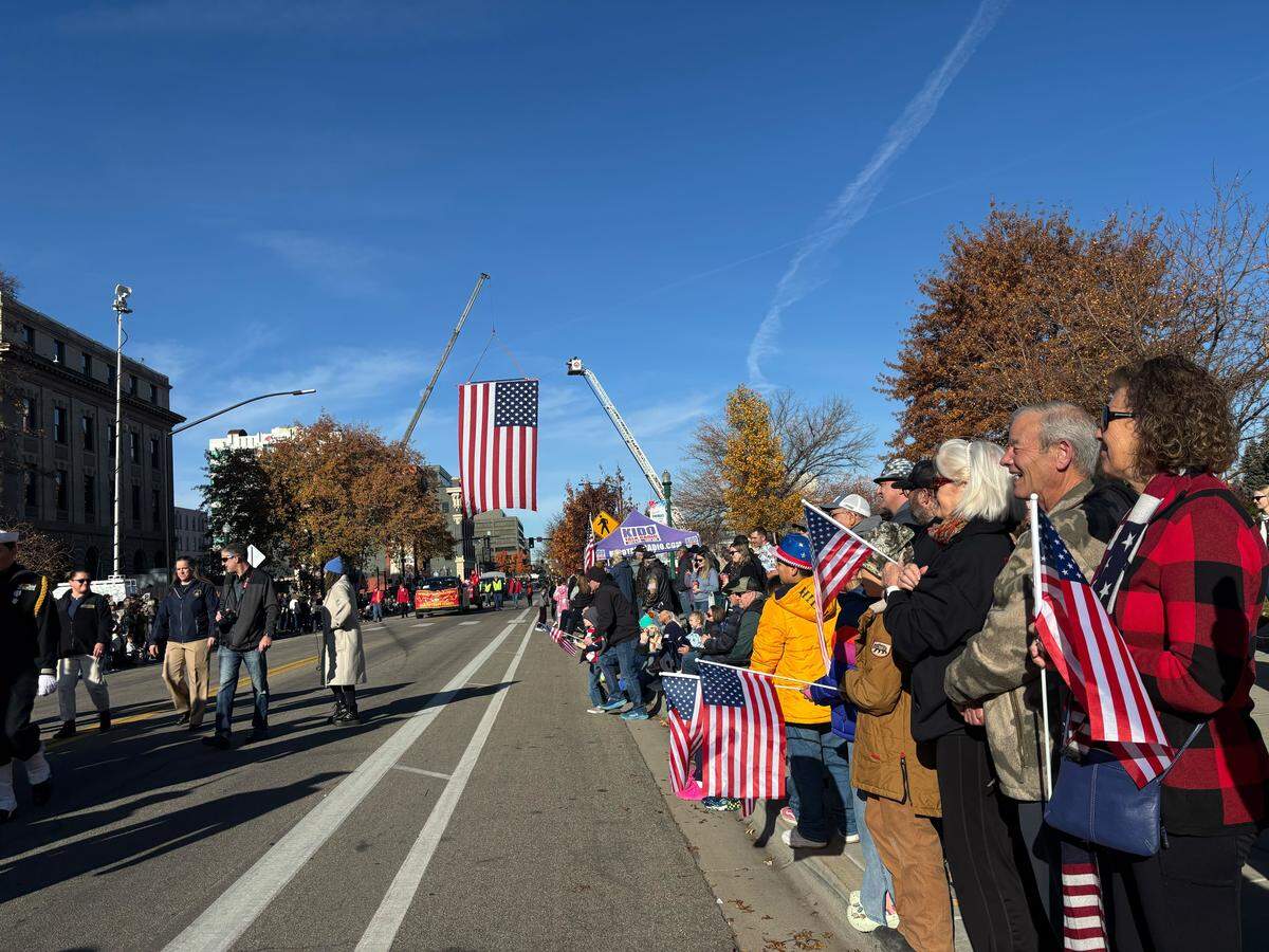 People waved American flags as the parade passed through Jefferson Street. 