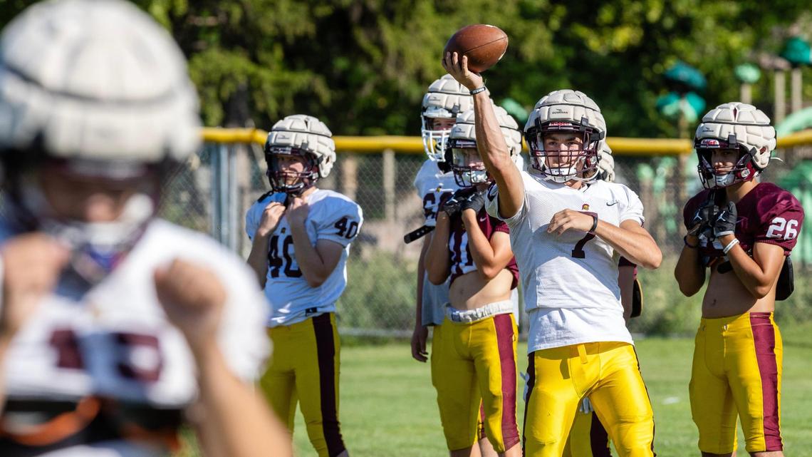 Nampa Christian quarterback Aiden Thompson delivers a pass Friday during practice. The Trojans start the season as the favorite to win the 2A Western Idaho Conference.
