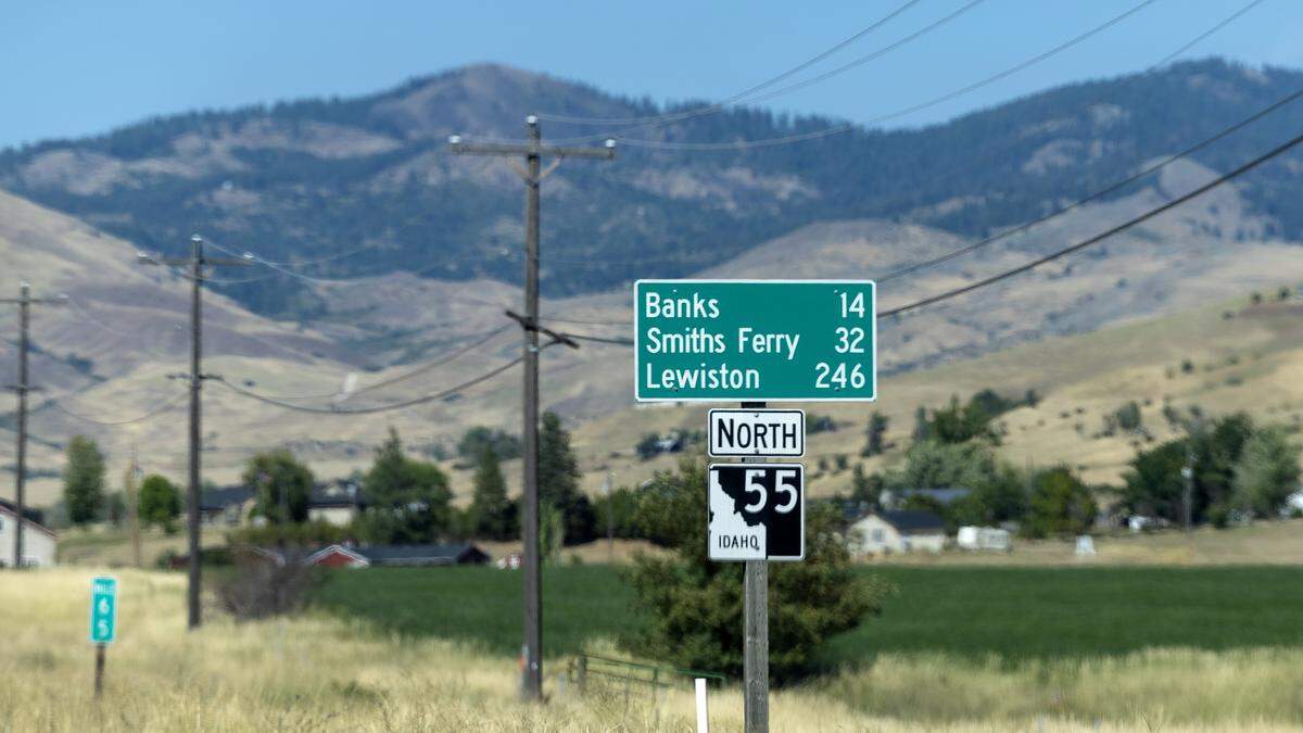 A sign in Horseshoe Bend gives mileage to Idaho towns along State Highway 55, August 15, 2025.