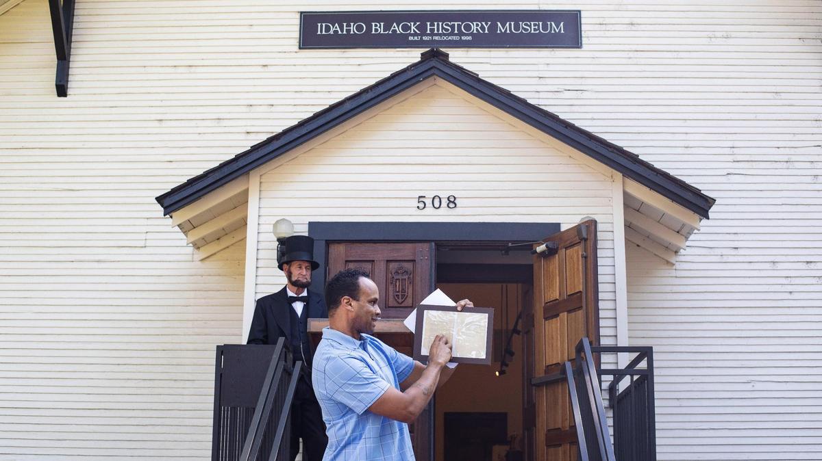Phillip Thompson, board president and director of the Idaho Black History Museum, reads from Original Emancipation Order No. 1 during a Juneteenth celebration at the Idaho Black History Museum in Boise on June 19, 2021.