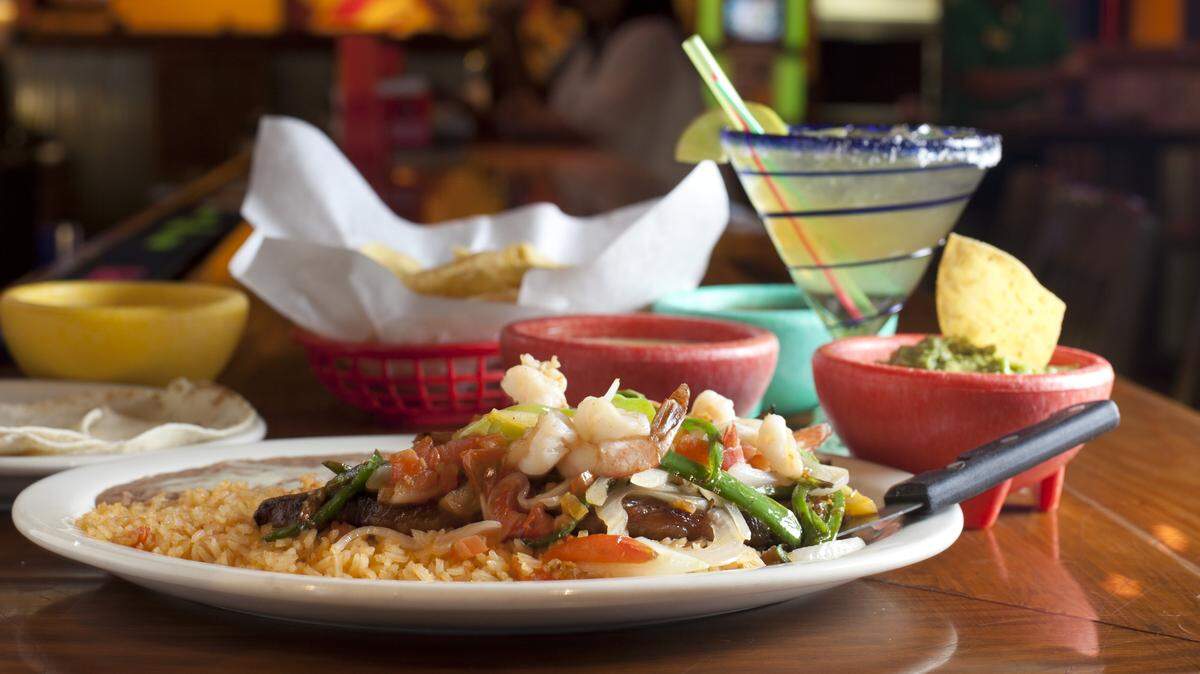 Jalapeños, billing itself from mild to wild, serves up a big ribeye steak topped with grilled shrimp, jalapeños, onions, bell peppers and tomatoes, served with rice and bean. The restaurant features an array of sauces, like homemade guacamole, bean dip, house salsa and their famous cheese sauce  accompanied by, of course, a top-shelf Ultimate Margarita.