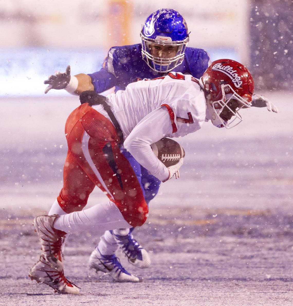 Boise State linebacker Tyson Maeva (58) makes a stop on Fresno State wide receiver Derrion Grim (7) during the Mountain West Championship game at Albertsons Stadium. Fresno State defeated Boise State 19-16. Saturday December, 01, 2018.