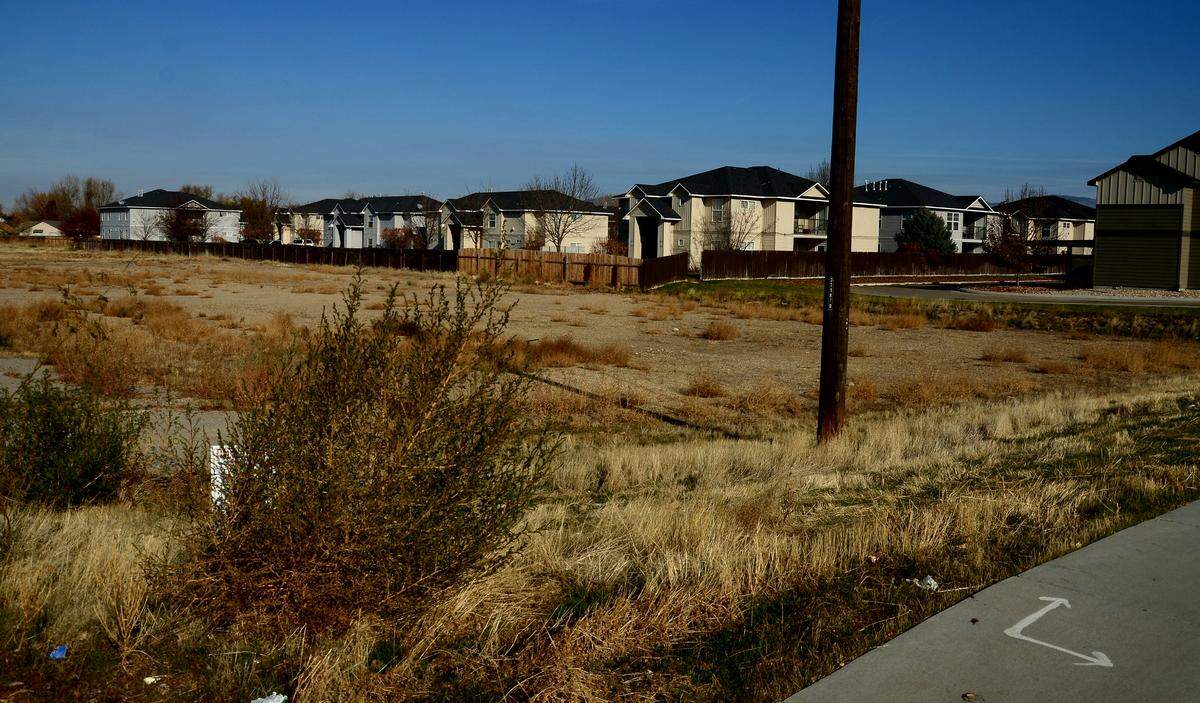 The Hawkins Cos.’ proposed apartments would go up on this site next to the complex in the background on West Fairview Avenue, just east of Cloverdale Road.