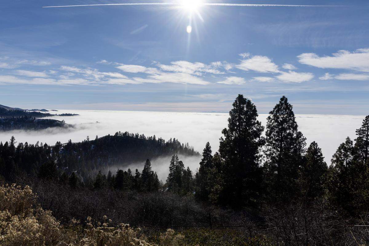 Clouds and fog settle into the valleys below the headwaters of Upper Dry Creek off Bogus Basin Road, Tuesday, Jan. 20, 2026. 