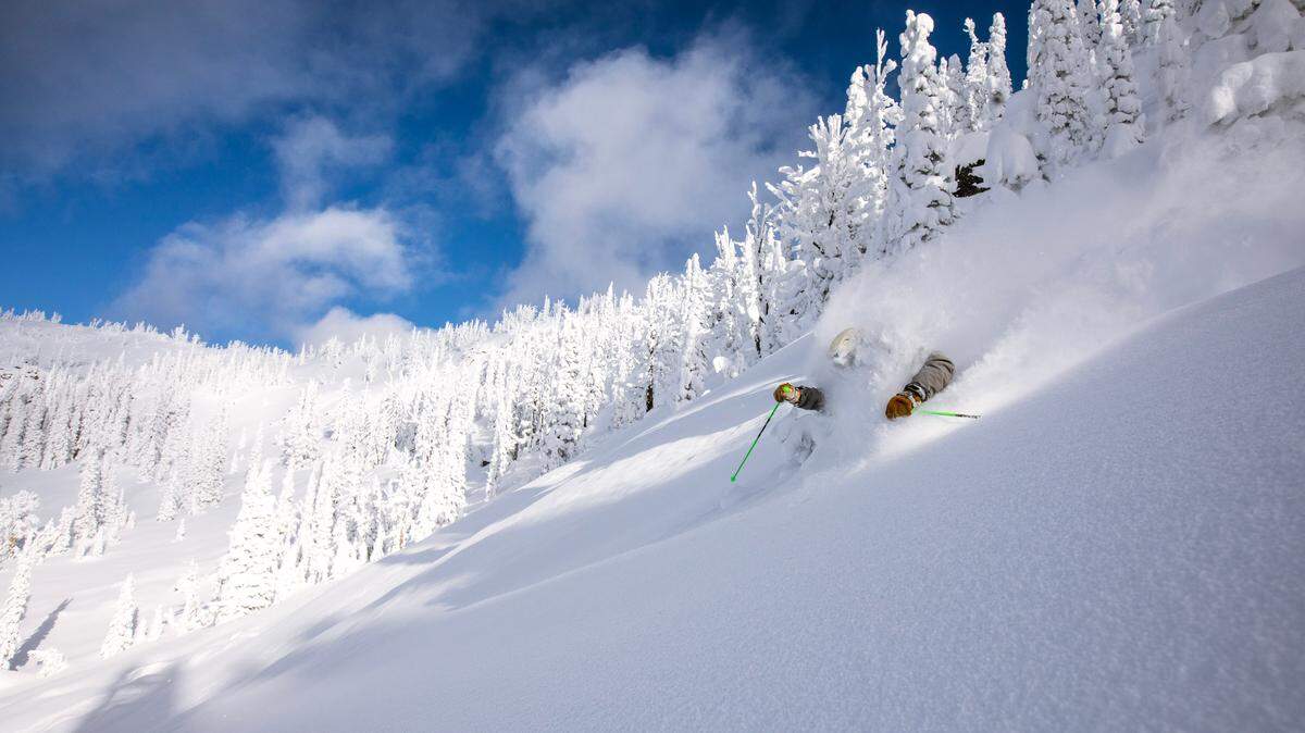 A skier plows through powder at Brundage Mountain Resort on New Year’s Eve 2021. Brundage and Tamarack recently announced 2022-23 season pass sale prices.