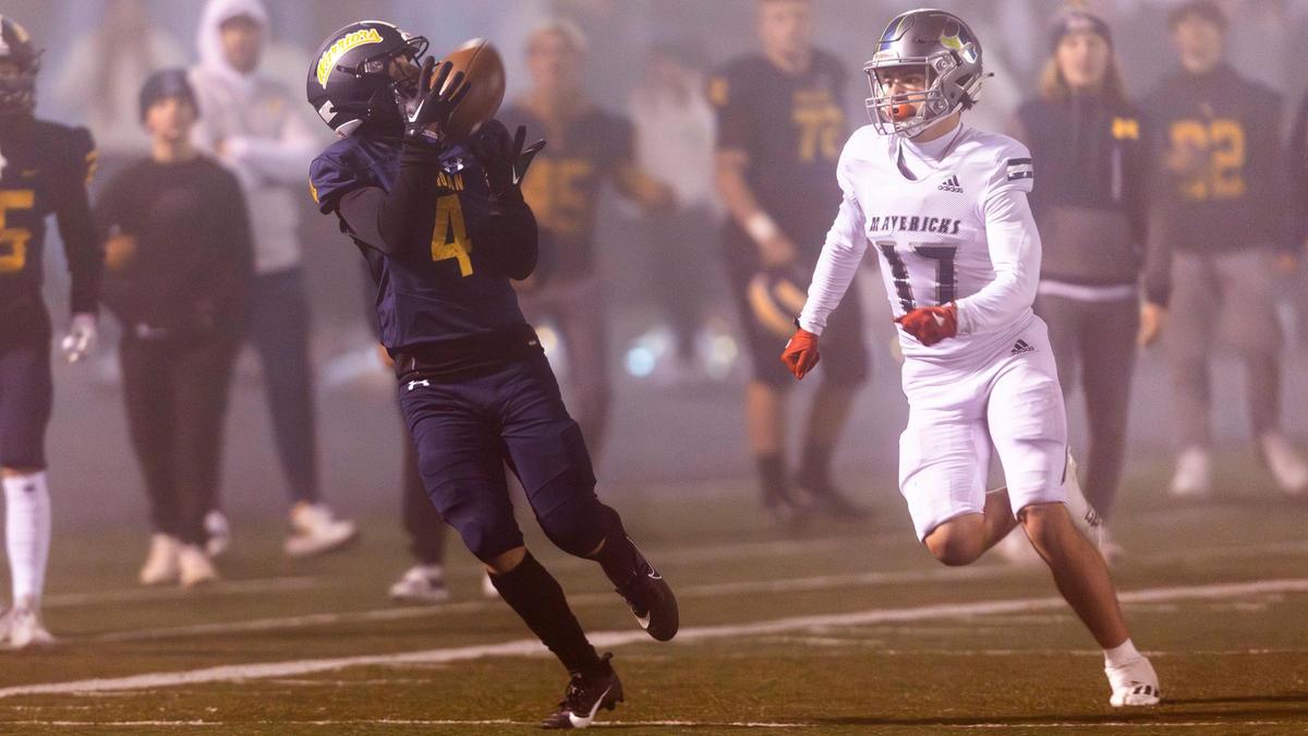 Meridian wide receiver Carver Martin pulls in a long pass against Mountain View last week. The Warriors travel to face Highland in the 5A state semifinals Friday at Holt Arena in Pocatello.