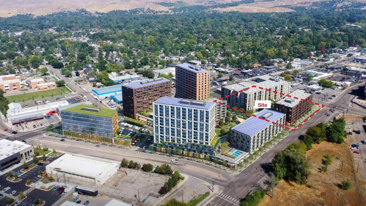 This aerial rendering shows the site of the building outlined at center right, behind the proposed Whitewater and Main development that has been paused.