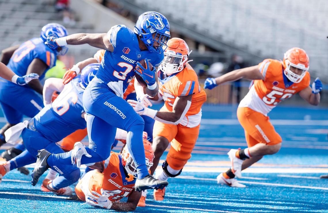 Boise State running back Danny Smith carries the ball during their spring game held on Saturday, April 9, 2022, at Albertsons Stadium.