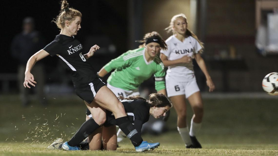Bishop Kelly’s Alexis Pond fires into an empty net for the only goal in the 4A District Three girls soccer championship Thursday at Middleton High School.