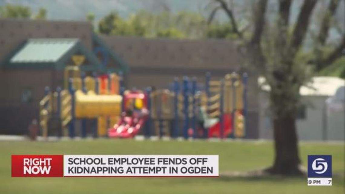 A teacher with a gun stopped a 41-year-old man who grabbed an 11-year-old girl on the playground at an Ogden, Utah, school, police say.