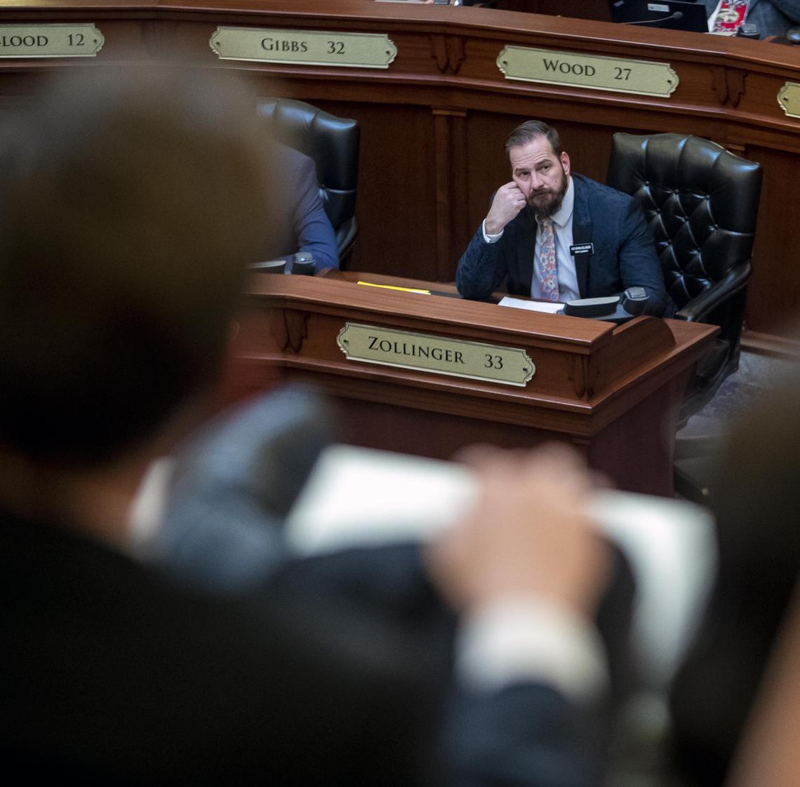 Rep. Bryan Zollinger R-Idaho Falls, attends a session on the floor of the Idaho House of Representatives on Thursday.