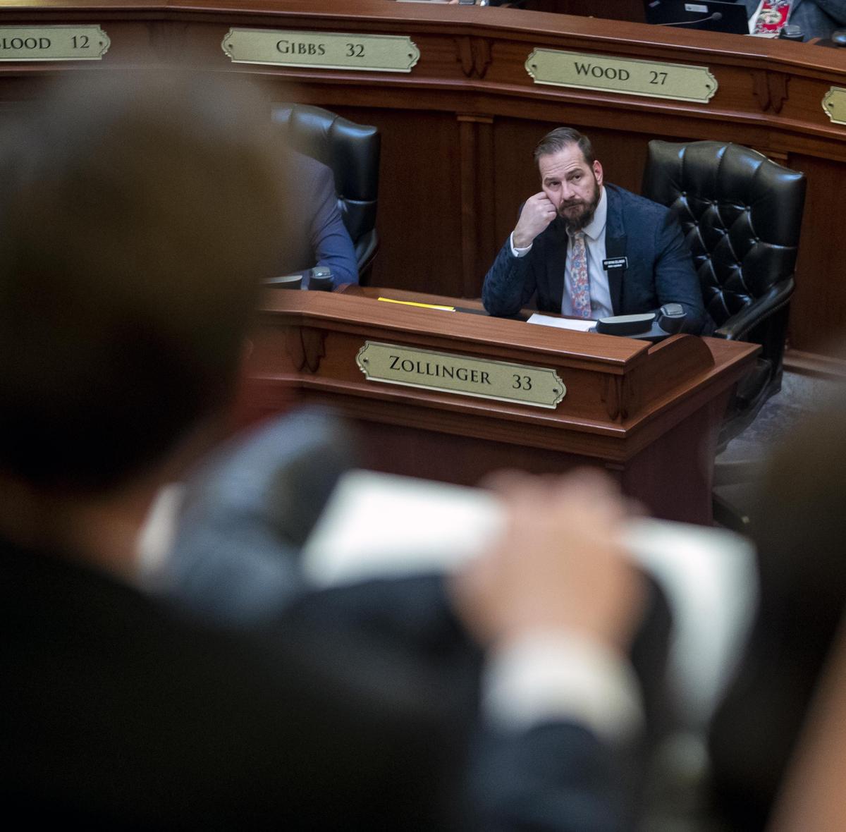 Rep. Bryan Zollinger R-Idaho Falls, attends a session on the floor of the Idaho House of Representatives on Thursday.