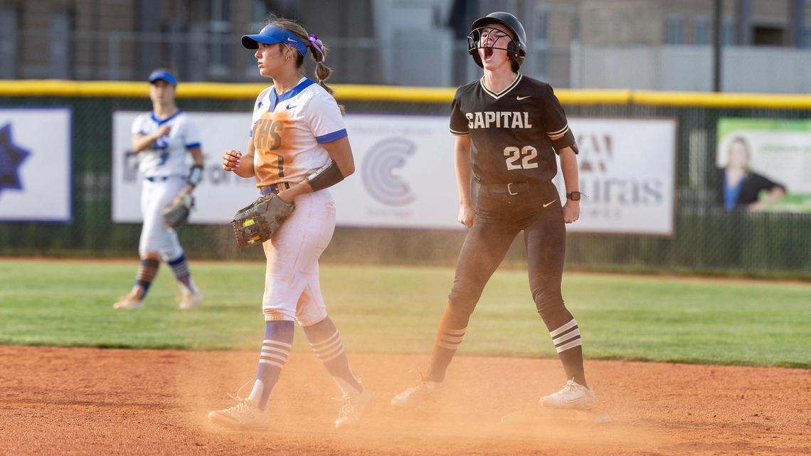 Capital senior Lizzy Turpen reacts after making it to second base in a 4-1 upset win over Timberline on Thursday in the 6A state tournament.