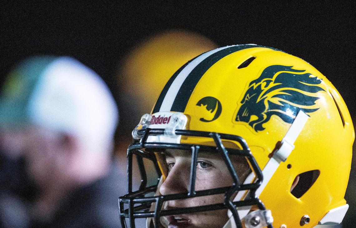 A small rhino sticker, seen here on wide receiver Matthew Wallace’s helmet, was a symbol and ethos championed by Quane Kenyon, a longtime Borah assistant coach who died Sunday.