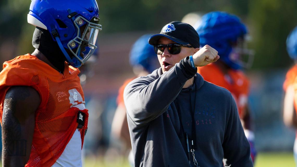 Boise State defensive coordinator Spencer Danielson talks technique with his defensive squad at the Broncos’ first day of fall camp, Wednesday, Aug. 3, 2022.