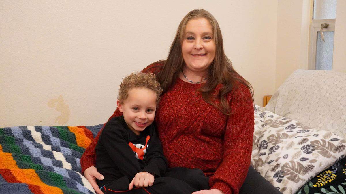 Isaiah, left, and Heidi sit on their bed. The Rev. Bill Roscoe, of the Rescue Mission, believes the Treasure Valley needs more transitional housing for people leaving homelessness.