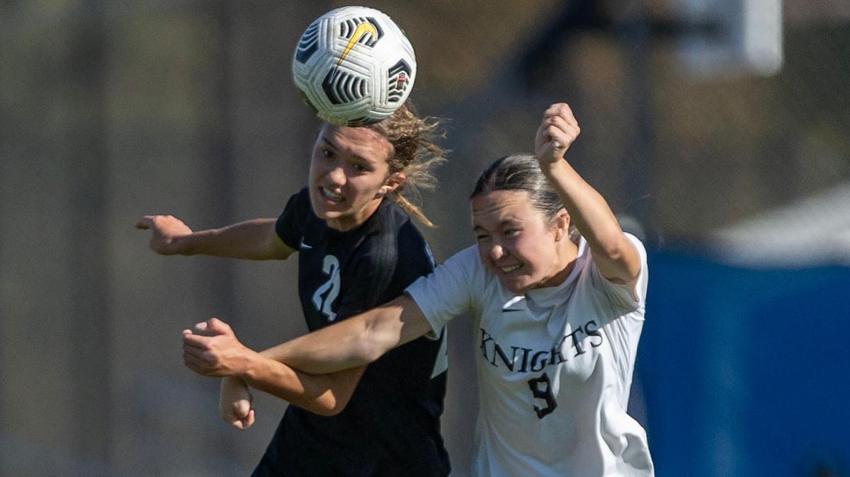 Bishop Kelly forward Kenzie Hill, right, led the 6A classification with 13 assists last fall. 