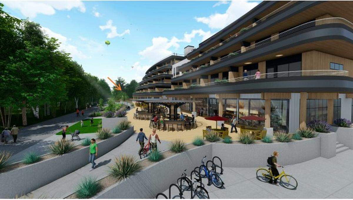 A rendering of the Boardwalk Apartments, now under construction on 41st Street, with a small arrow showing the location of Brooklyn Park LLC’s planned, smaller commercial and residential development immediately southeast. The Boise River Greenbelt is at left.