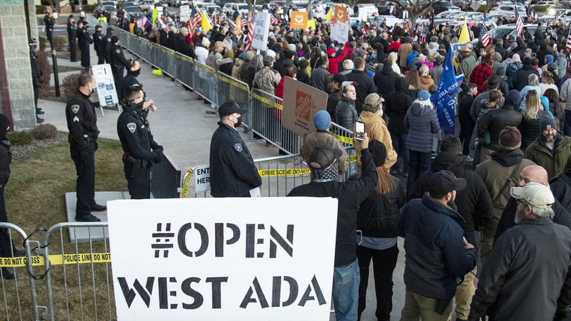 At an anti-mask protest outside Central District Health last December, one person made their feelings known about schools in the West Ada district.