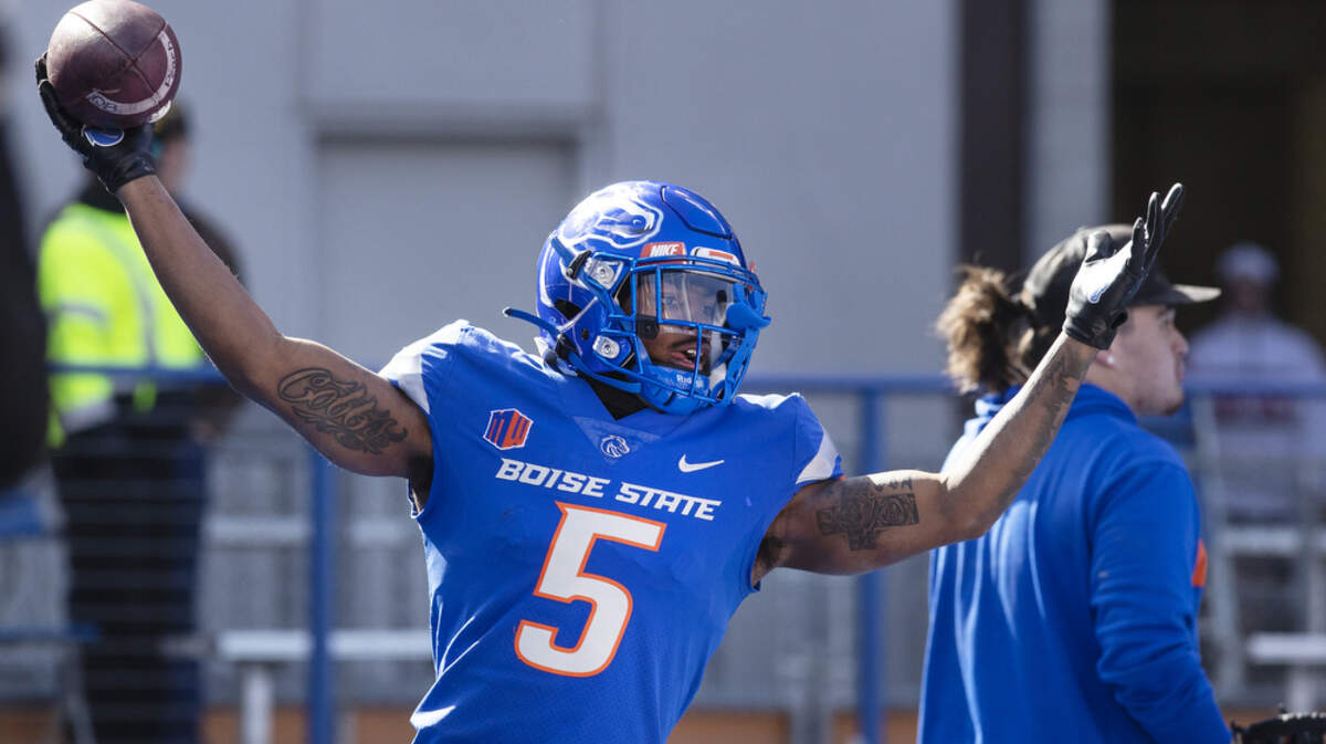 Boise State wide receiver Stef Cobbs celebrates after scoring a touchdown in the Broncos’ spring game in April.