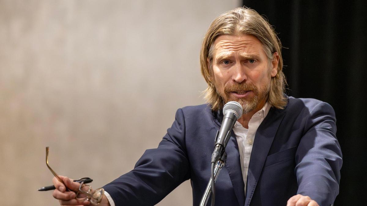 McKay Cunningham asks a question while moderating a Boise mayoral candidate forum in this 2023 file photo.