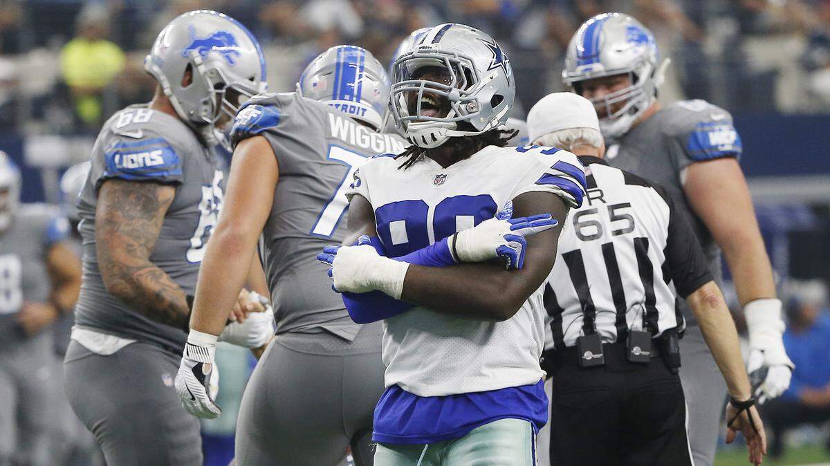 Dallas Cowboys defensive end DeMarcus Lawrence celebrates sacking Detroit Lions quarterback Matthew Stafford on Sept. 30 in Arlington, Texas.