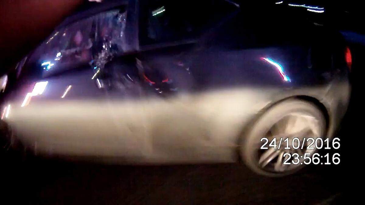 Bullets hit the car driven by David Grant as a police officer opens fire the night of Oct. 24, 2016, in Fruitland, Idaho. One of the rounds entered Grant’s neck and severed his spine.