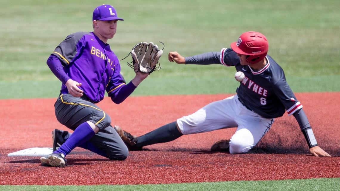Owyhee’s Gage Haws, right, steals second base ahead of a throw to Lewiston’s Zachary Massey on Thursday.