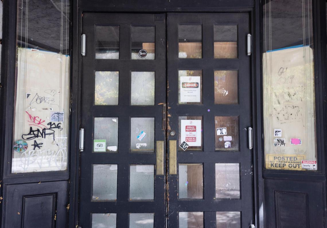 No-trespassing signs hang in the front door.