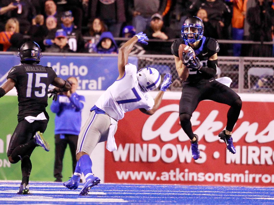 Boise State nickelback Kekaula Kaniho (28) intercepts a pass intended for Air Force wide receiver Geraud Sanders (7) in the second half at Albertsons Stadium on Friday Sept. 20th, 2019.
