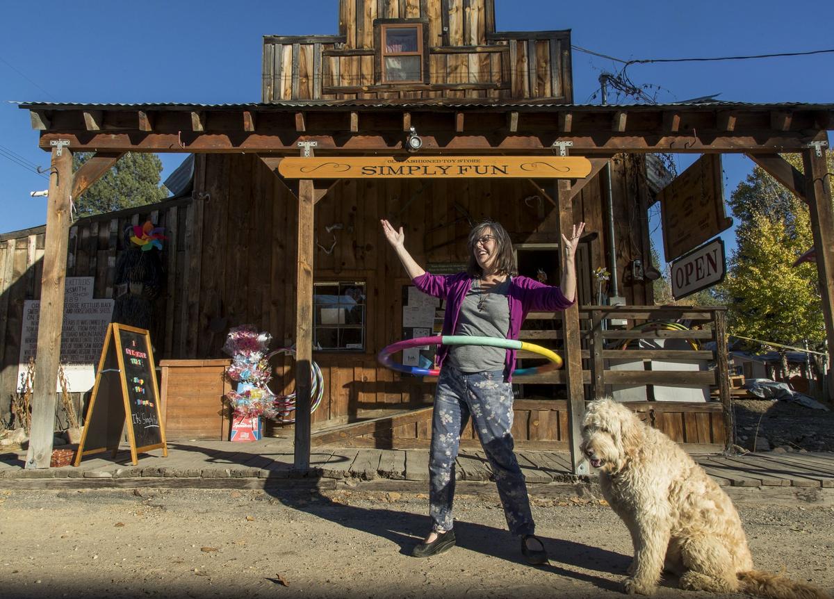 Rhonda Jameson, 56, Originally from Texas; store owner in Idaho City (with her dog Mojo).