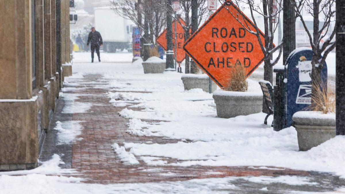 Snow makes a mess of the sidewalks along Capitol Boulevard in downtown Boise on Wednesday. The National Weather Service is forecasting single-digit low temperatures in the Treasure Valley from Friday night through Sunday. Snow will continue on Thursday.