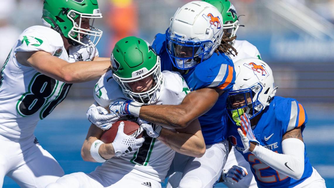 Boise State safety Zion Washington wraps up North Dakota receiver Bo Belquist in the third quarter of Saturday’s win at Albertsons Stadium.