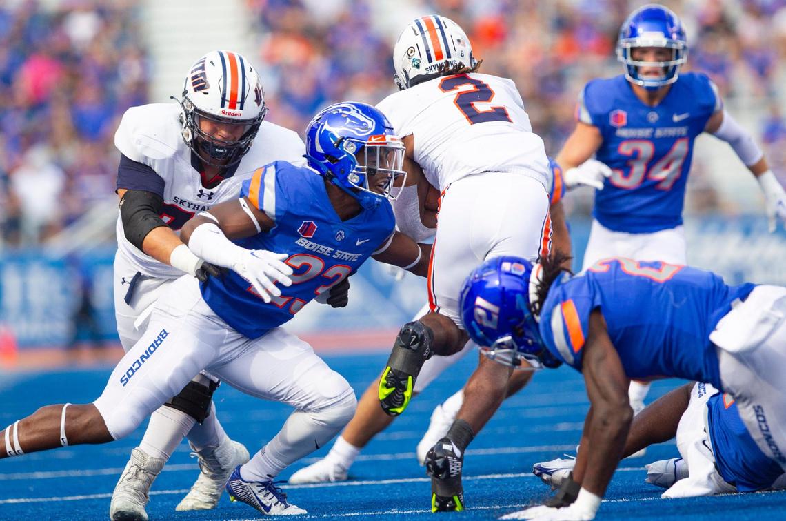 Boise State safety Seyi Oladipo makes a tackle on UT Martin running back Sam Franklin during the second half of the game, Saturday, Sept. 17, 2022, at Albertsons Stadium.