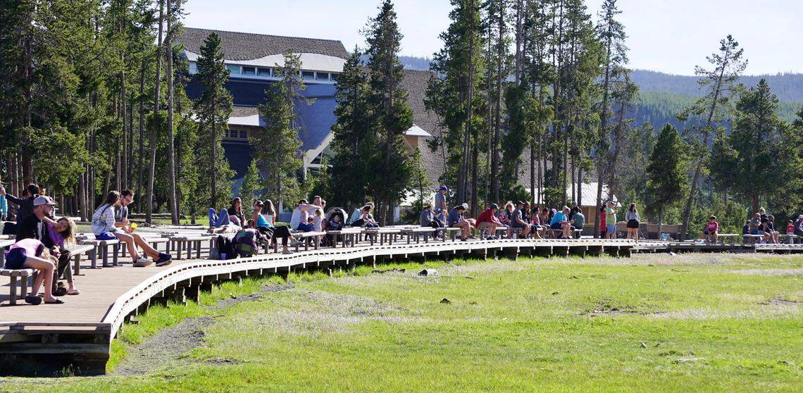 The crowd waiting to watch Old Faithful erupt on May 31, 2020, at Yellowstone National Park was smaller than usual with limited access to the park. The Montana entrances opened the next day.