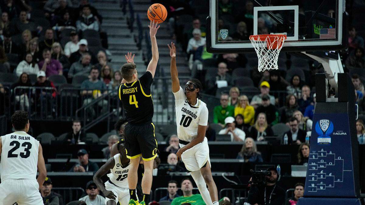 Colorado forward Cody Williams (10) tries to block a shot during the second half of the Buffaloes’ loss to Oregon in the Pac-12 championship game in Las Vegas on Saturday. Williams is a likely first-round pick in this year’s NBA Draft.